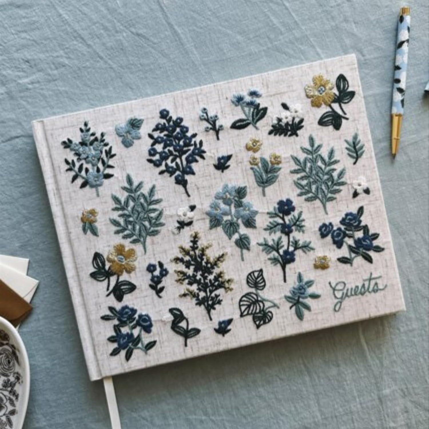 imageRIFLE PAPER CO Wildwood Embroidered Fabric Guest Book Hard Cover Wrapped in Book Cloth ampamp Grosgrain Ribbon Bookmark LayFlat Binding 144 Ruled Pages with Metallic Gold Ink 8quot L x 575quot WWildwood